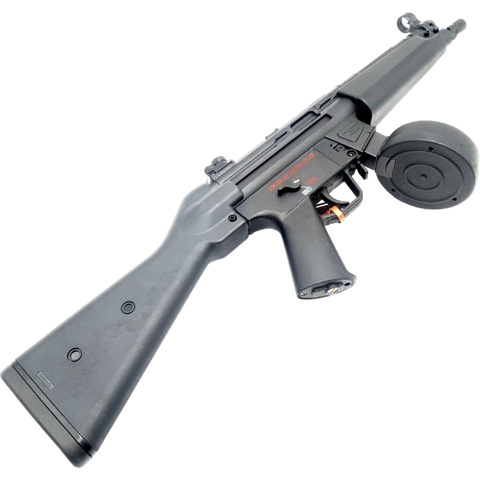 Black MP5 orby gun with realistic drum mag, metal components.